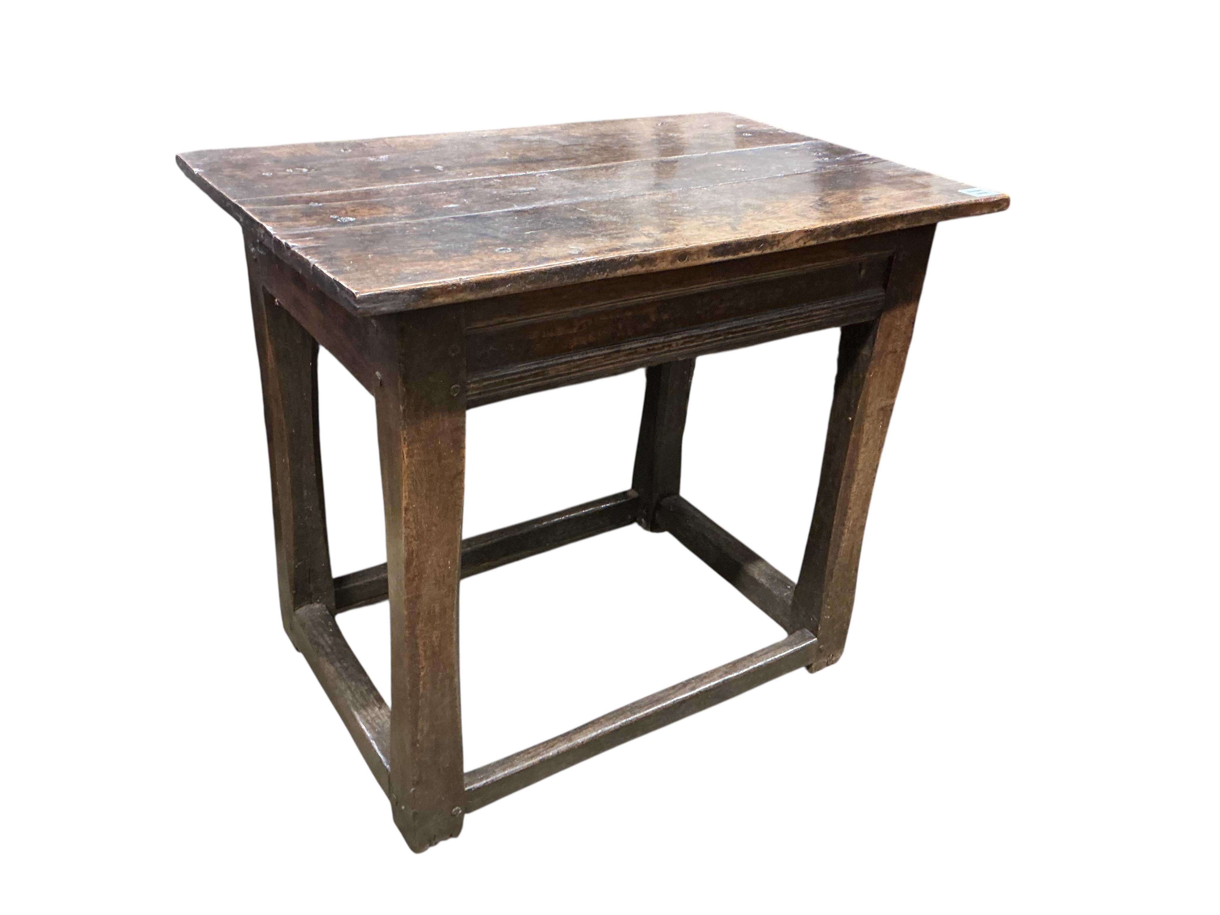 A small late 17th century oak side table, the rectangular top on square chamfered supports, width 80cm, depth 53cm, height 71cm